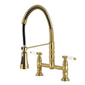 Kingston Tulare GS1277BPL - Bel-Air Double-Handle 2-Hole Deck-Mount Pre-Rinse Bridge Kitchen Faucet, Brushed Brass