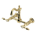 Kingston Heirloom KS2442TAL - Tudor Two-Handle 2-Hole Wall Mount Bridge Kitchen Faucet, Polished Brass
