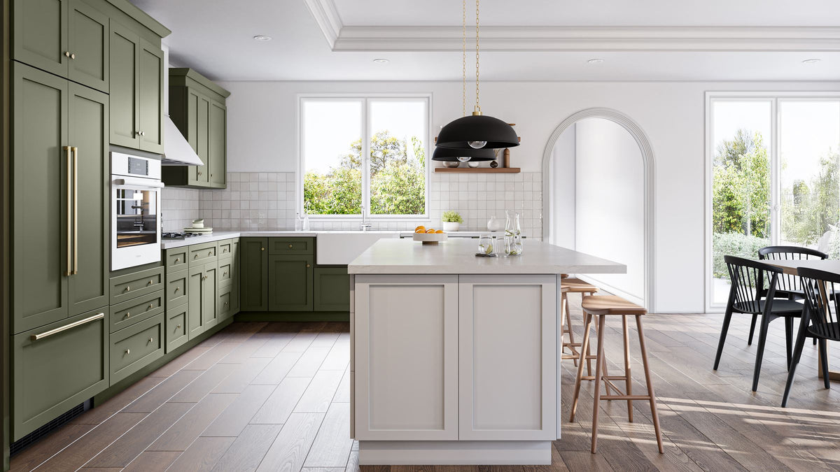 Shaker kitchen with island, farmhouse sink and brass hardware — plan yours in Kitchen Studio