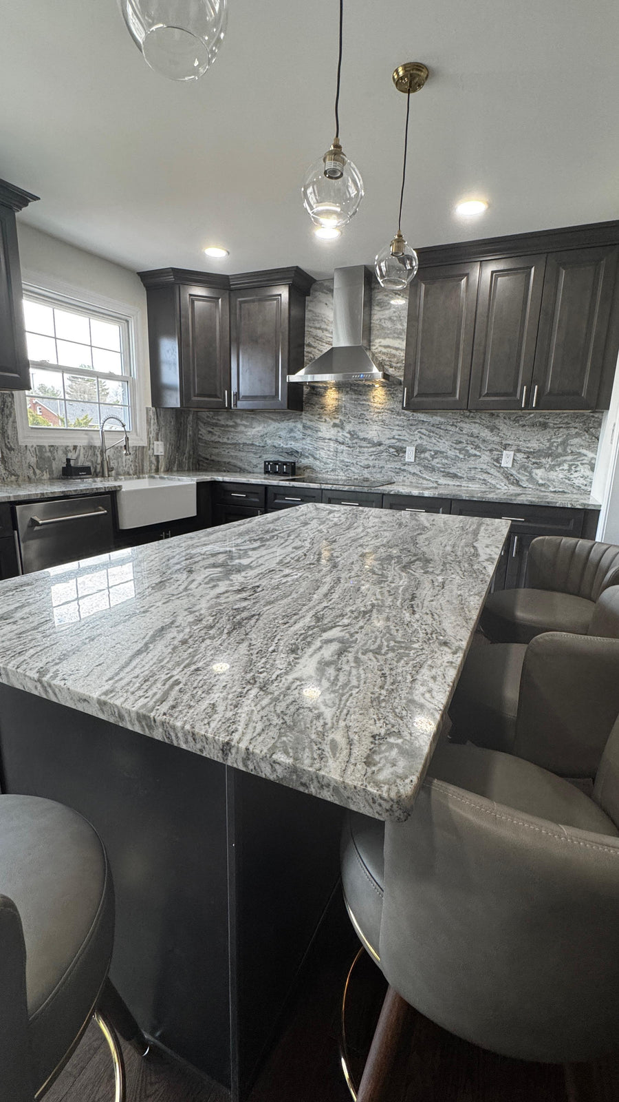 Dark espresso kitchen with granite island